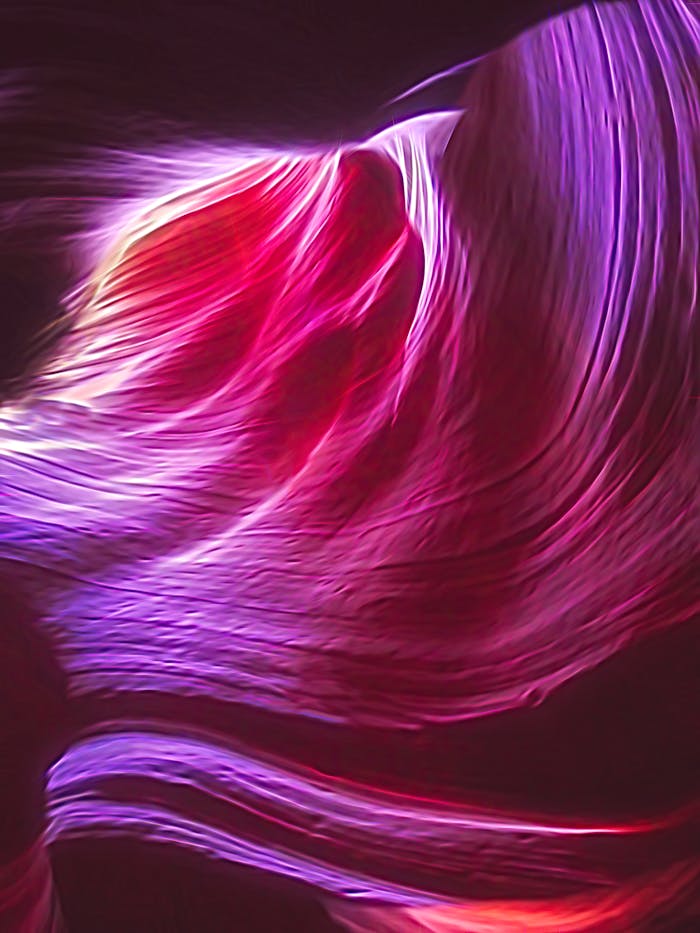 The Art of Drawing Readers In: Your attractive post title goes here Abstract image of vibrant flowing light trails in dynamic motion.
